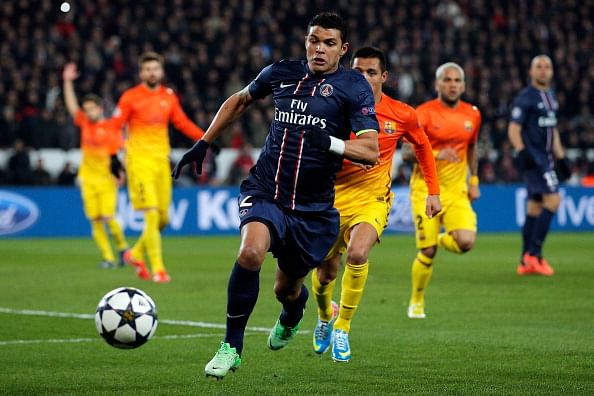 Thiago Silva of PSG and Alexis Sanchez of Barcelona chase the ball mduring the UEFA Champions League Quarter Final match between Paris Saint-Germain and Barcelona FCB at Parc des Princes on April 2, 2013 in Paris, France. (Photo by Dean Mouhtaropoulos/Getty Images)